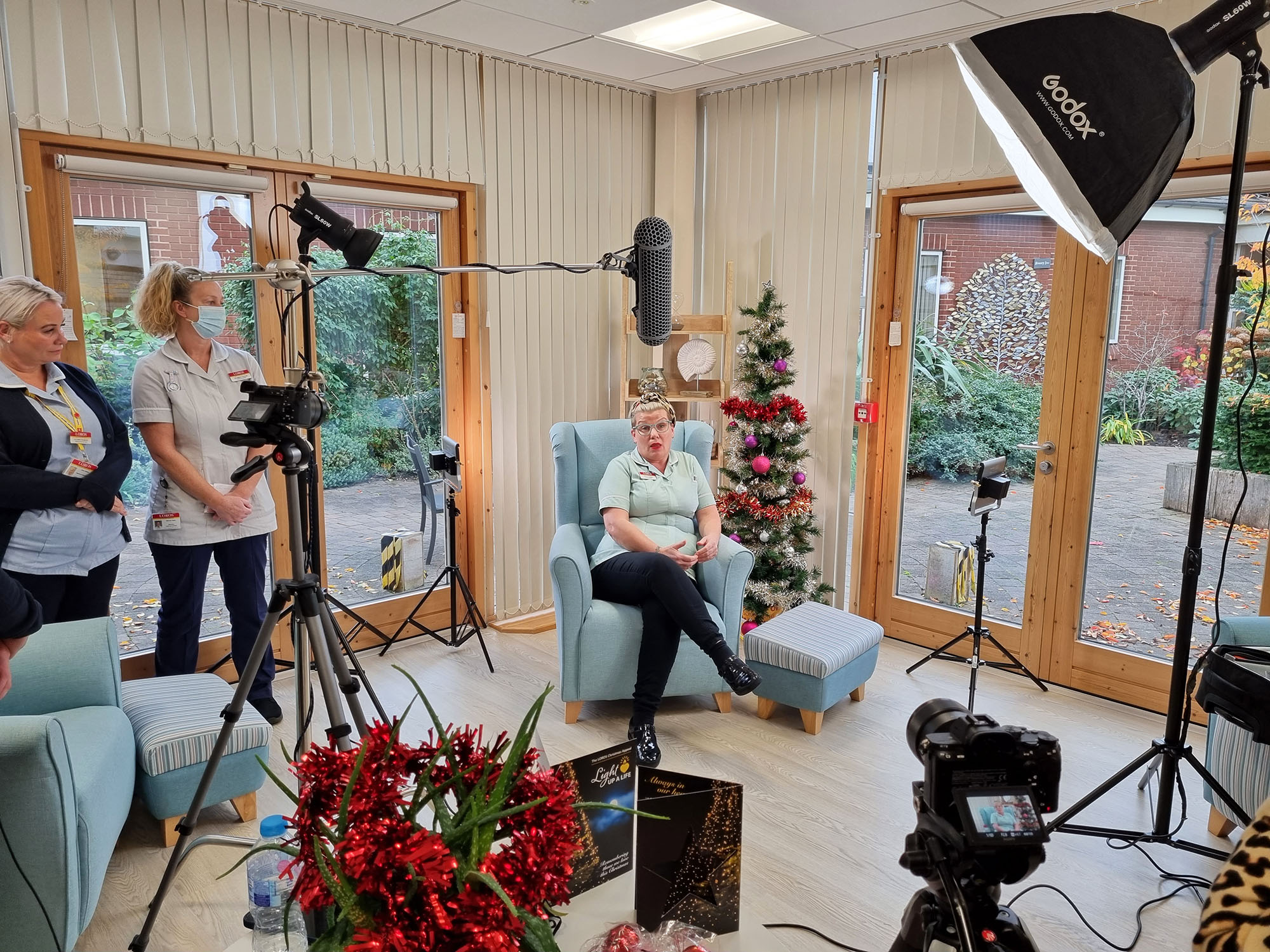 A behind the scenes photo of filming the Christmas video for LOROS