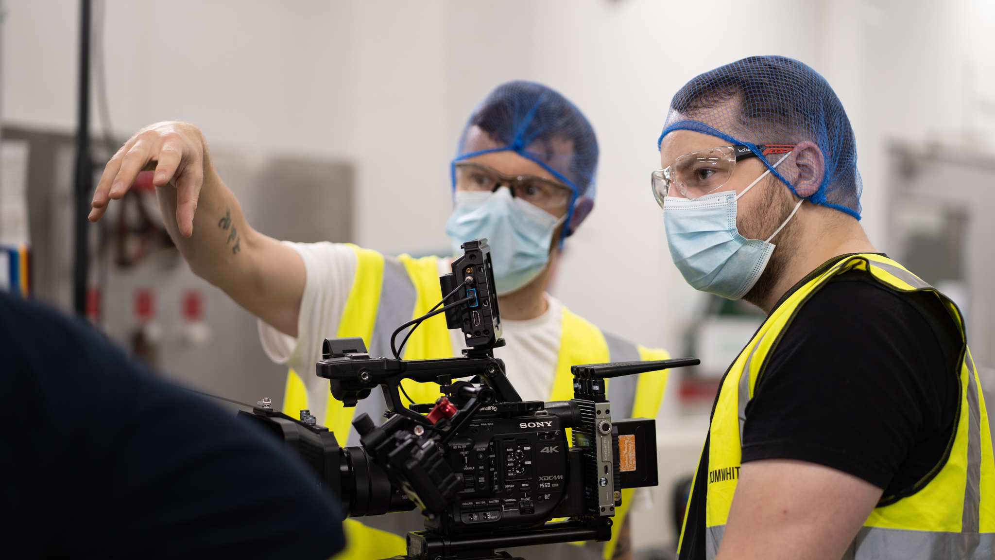 A behind the scenes photo of the Incite team filming a safety video