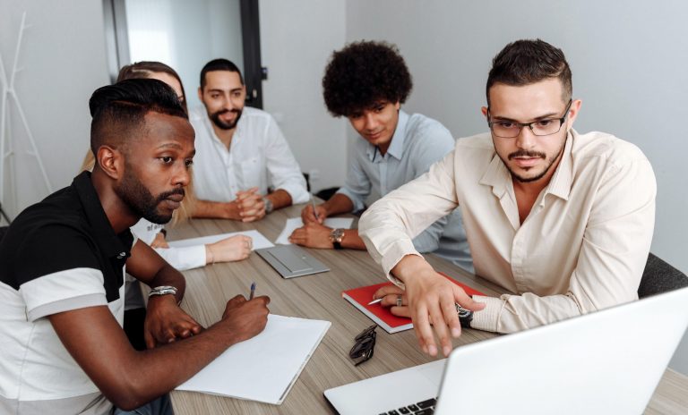 Employees watching an induction video